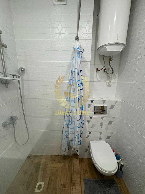 Світла 1-кімнатна квартира комфорт-класу з дизайнерським ремонтом Киев - изображение 8