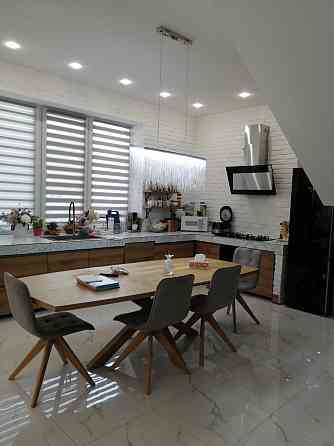 Современный дом с бассейном в Совиньоне Limanka