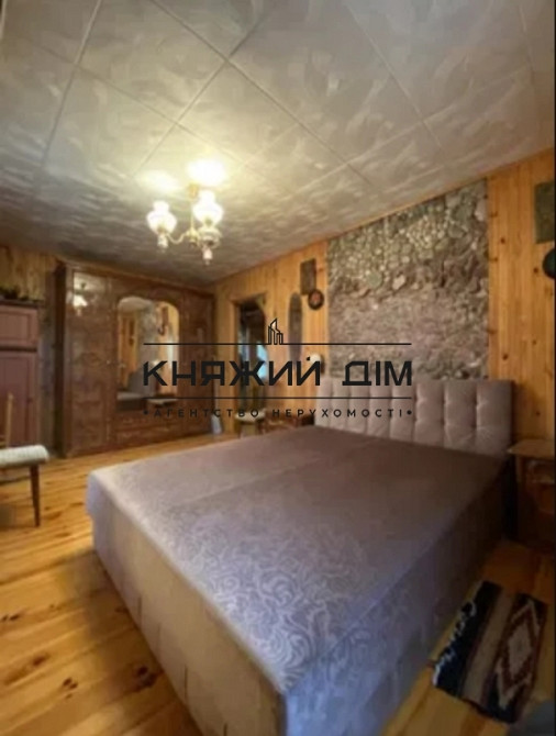 Продаж будинку з гаражем в мальовничому місці,біля озера і лісу у смт Лісове. № 2211608  - фото 1