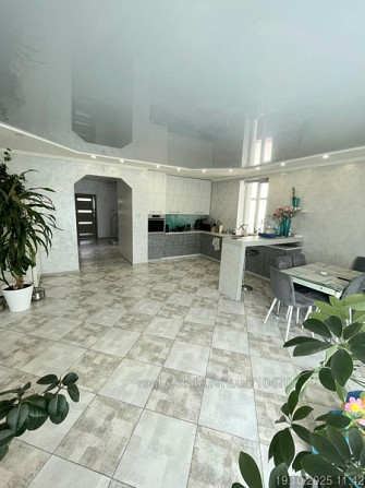 Продаж 3-поверховий  з ділянкою 3 сот 230 кв.м 6 кімн. на Білозіра вул. Рудне - фото 4