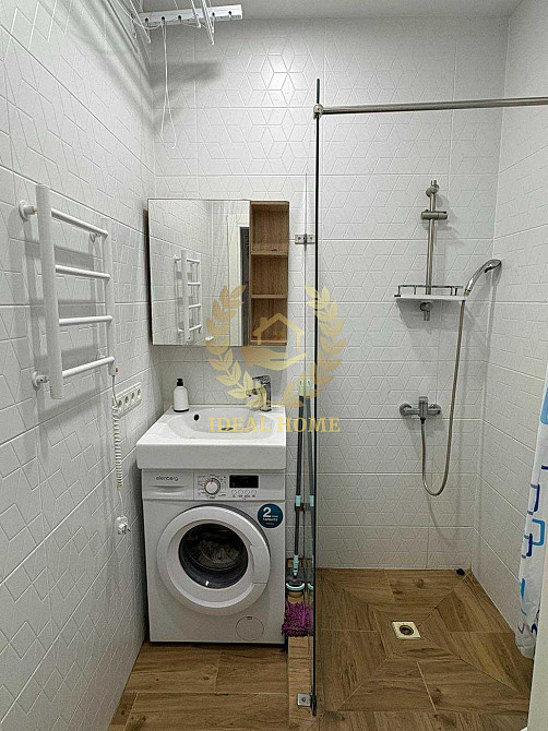 Світла 1-кімнатна квартира комфорт-класу з дизайнерським ремонтом Киев - изображение 7