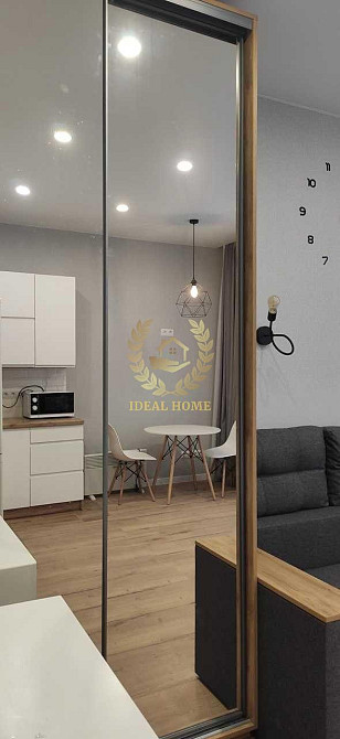 Світла 1-кімнатна квартира комфорт-класу з дизайнерським ремонтом Киев - изображение 4