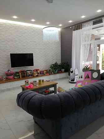 Современный дом с бассейном в Совиньоне Limanka