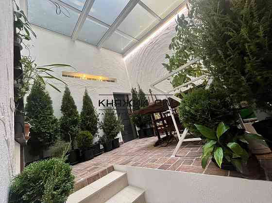 Дворівнева квартира із зимовим садом у серці Подолу. № 21145229 Киев