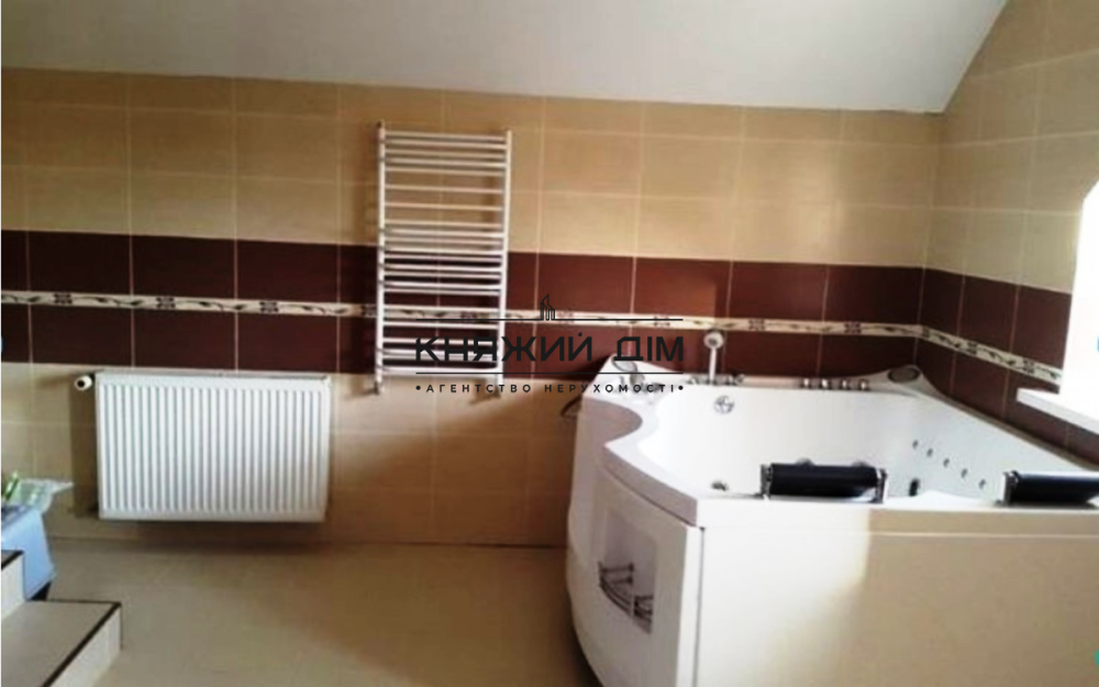 Продажа 2–х этажного дома общей площадью 205 м2. № 229466  - фото 13