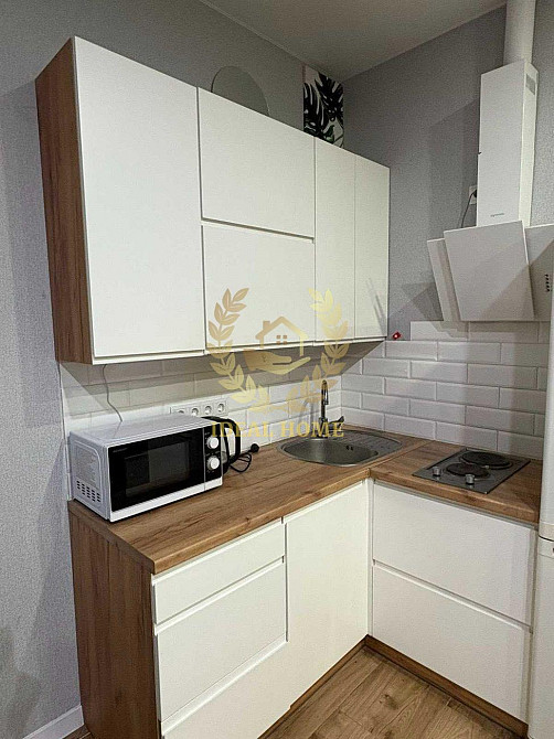 Світла 1-кімнатна квартира комфорт-класу з дизайнерським ремонтом Киев - изображение 5