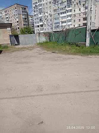 Продам півбудинку і земельну ділянку 6.9 сот.в центрі міста.. Кропивницький