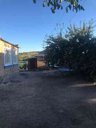 Продається будинок із садом та виходом до річки Високі Байраки