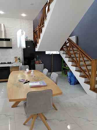 Современный дом с бассейном в Совиньоне Limanka