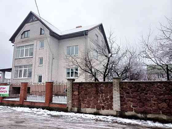 Продаж 3-поверховий Будинок з ділянкою 10 сот 400 кв.м 7+ кімн. на Гаражна Zhytomyr
