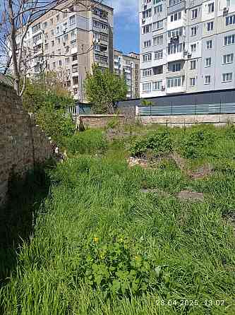 Продам півбудинку і земельну ділянку 6.9 сот.в центрі міста.. Кропивницький